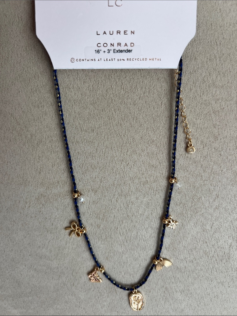 NWT LC Lauren Conrad Blue and Gold Multi-Charm Necklace